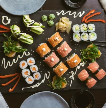 Sushi is a Japanese traditional dish that typically consists of raw fish, rice, and vegetables.